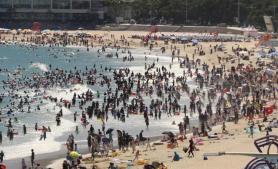 PHOTOS: Nationwide heat wave persists as vacation season begins