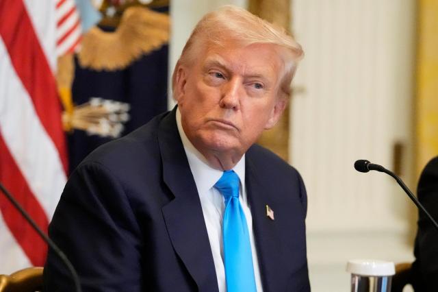 US President Donald Trump listens during an event at the White House in Washington DC on July 30 2025 AP-Yonhap