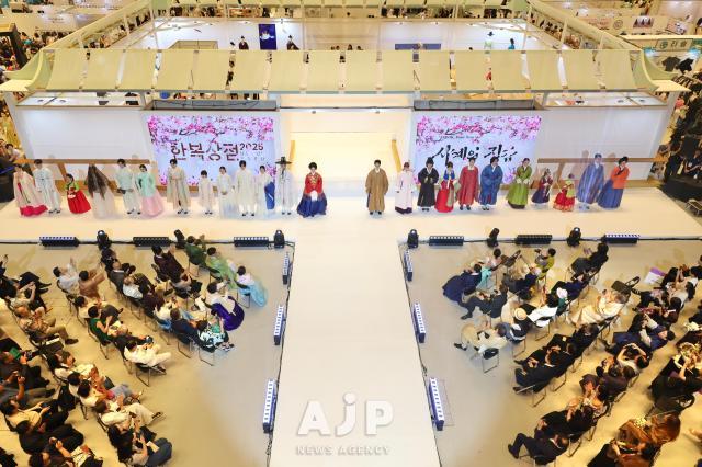 Models wearing traditional South Korean hanbok take a stage during the finale of the Hanbok Expo fashion show held at COEX in Seoul on Aug 7 2025 AJP Han Jun-gu