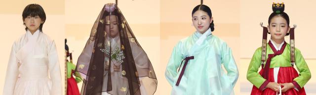This image is a collection of models wearing hanbok during a fashion show session of the Hanbok Expo held in the southern Seoul district of Gangnam on August 7 AJP Han Jun-gu