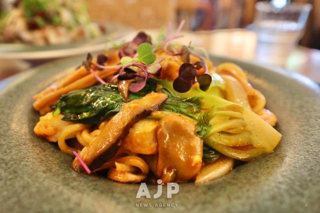 A platter of spicy stir-fried jjamppong spicy noodles with plant-based shrimp meat Aug11 2025 AJP Han Jun-gu