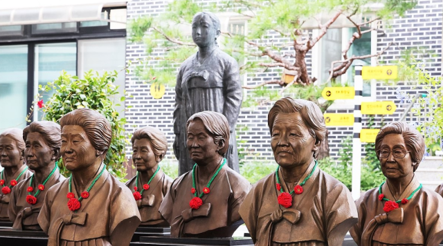 Statues of South Korean victims of sexual slavery in Japanese military brothels are seen in Gwangju South Korea on Aug 21 2025 Yonhap