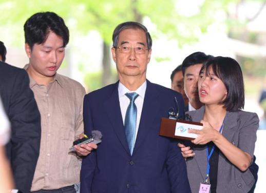 前国务总理韩德洙出庭接受逮捕必要性审查