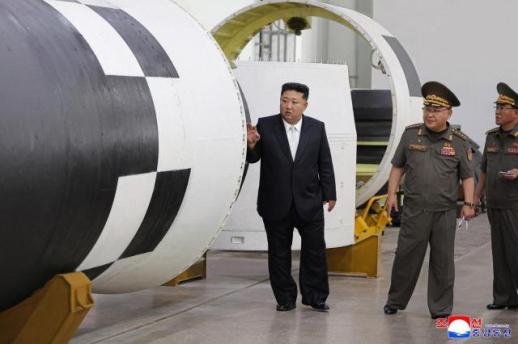 Kim Jong-un inspects institute for new solid-fuel ICBM engine