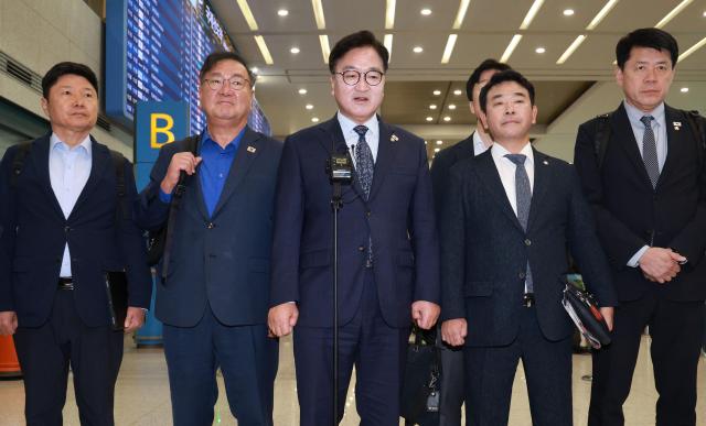 韩国国会议长禹元植结束中国行程回国