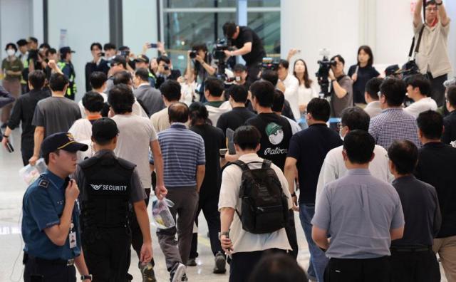 South Korean workers return home after weeklong detention in Georgia