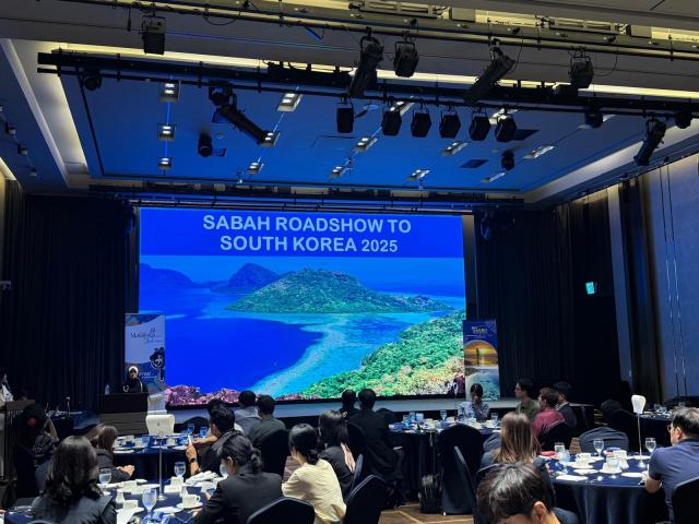 The Tourism Malaysia Seoul poses for a photo with the Batik Air Malaysia during the Sabah Roadshow to South Korea 2025 event. Courtesy of the Tourism Malaysia Seoul