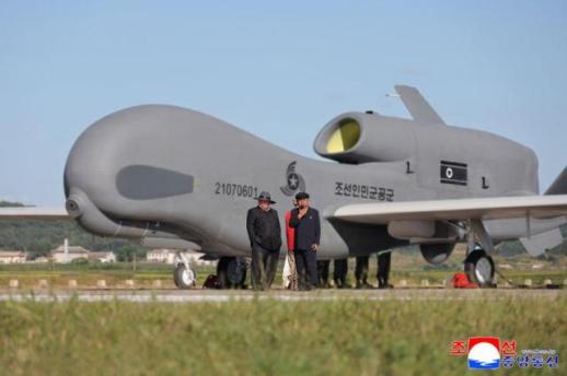 North Korean leader inspects test of tactical drones