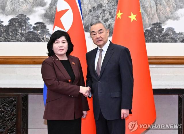 North Korean Foreign Minister Choe Son Hui left meets with Chinese Foreign Minister Wang Yi at the Diaoyutai State Guesthouse in Beijing on Sept 28 2025 in this photo released by the official North Korean Central News Agency the following day Yonhap