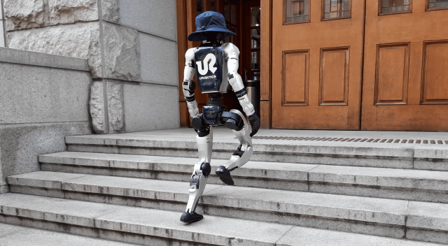 This image shows a URobotics humanoid robot walking in an urban environment Courtesy of KAIST