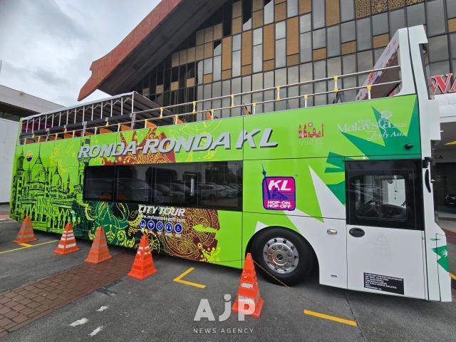 A hop on hop-off tour bus on display at the Global Travel Meet 2025 in Kuala Lumpur Oct 1 2025 AJP Kim Dong-young