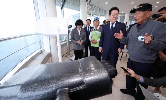 President Lee Jae Myung listens to remarks from displaced people at the Peace Observatory in Ganghwa Incheon on October 3 Joint Press Corps
