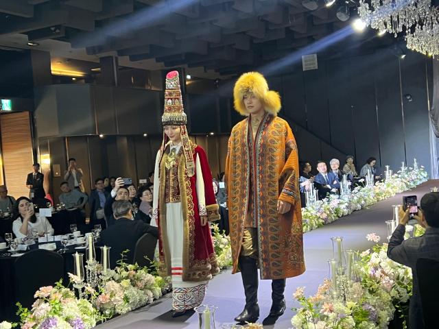 Models wearing traditional Kazakh costumes walk the runway during the Central Asia–Korea Friendship Day fashion show in Seoul Courtesy of the Embassy of Kazakhstan in the Republic of Korea