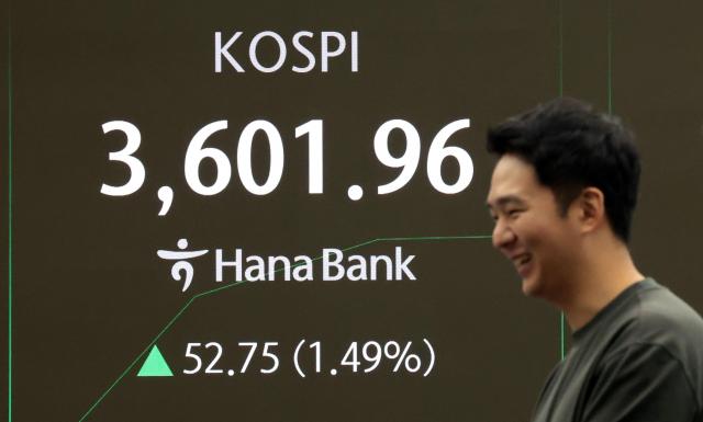 A display board at Hana Bank in Jung-gu Seoul shows the KOSPI index and other market indicators on Oct 10 when the index broke through the 3600 mark for the first time in history Yonhap