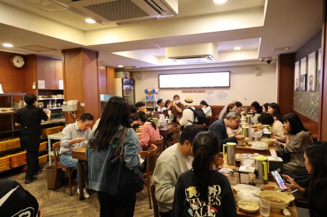 People dine at Myeongdong Kyoja a famous noodle restaurant in central Seoul’s Myeong-dong district on Oct 16 2025 AJP Yoo Na-Hyun