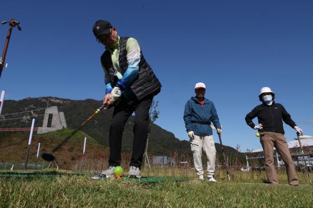 Participants take their swings during the Professional Park Golf Test at Hanyeoul Park Golf Course in Pocheon Gyeonggi Province on Oct 22 2025 AJP Yoo Na-Hyun