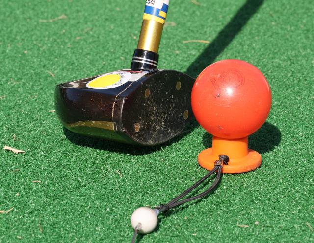 A close-up view of a park golf club and ball used in the Professional Park Golf Test at Hanyeoul Park Golf Course AJP Yoo Na-Hyun