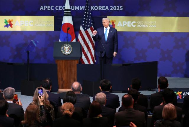 US President Donald Trump poses for a photo at the  Yonhap