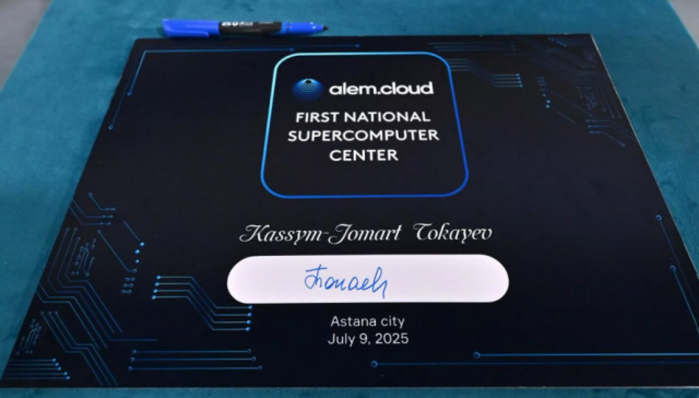 Kazakh President Kassym-Jomart Tokayev signs a plaque at the launch ceremony of the Alem Cloud First National Supercomputer Center in Astana July 9 2025 Courtesy of Press Service of the President of Kazakhstan