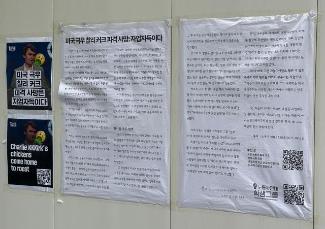 On the opposite side of the memorial posters criticizing Charlie Kirk were displayed on the Seoul National University campus on Sept 22 2025 AJP Kim Hee-su