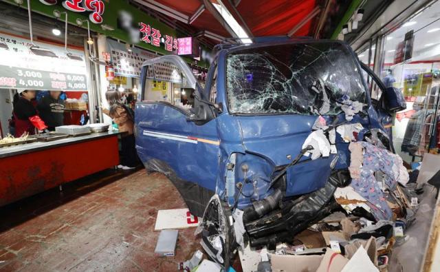 Two dead, 18 injured after pickup truck crashes into market in Bucheon