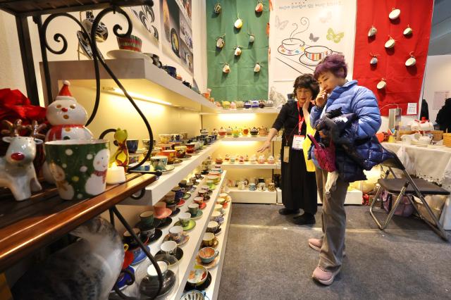 Visitors browse cups at Cafe Show 2025 held at COEX in southern Seoul Nov 20 2025 AJP Han Jun-gu
