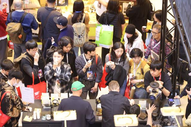 Visitors experience coffee tasting at Cafe Show 2025 held at COEX in southern Seoul Nov 20 2025 AJP Han Jun-gu