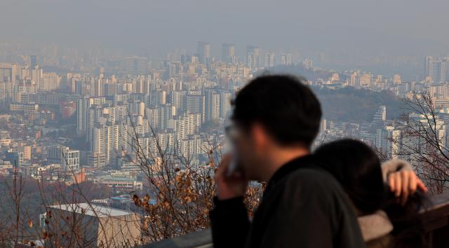 Apartment clusters in Seoul appear shrouded in haze as seen from Namsan in Seoul on Nov 24 2025 Yonhap