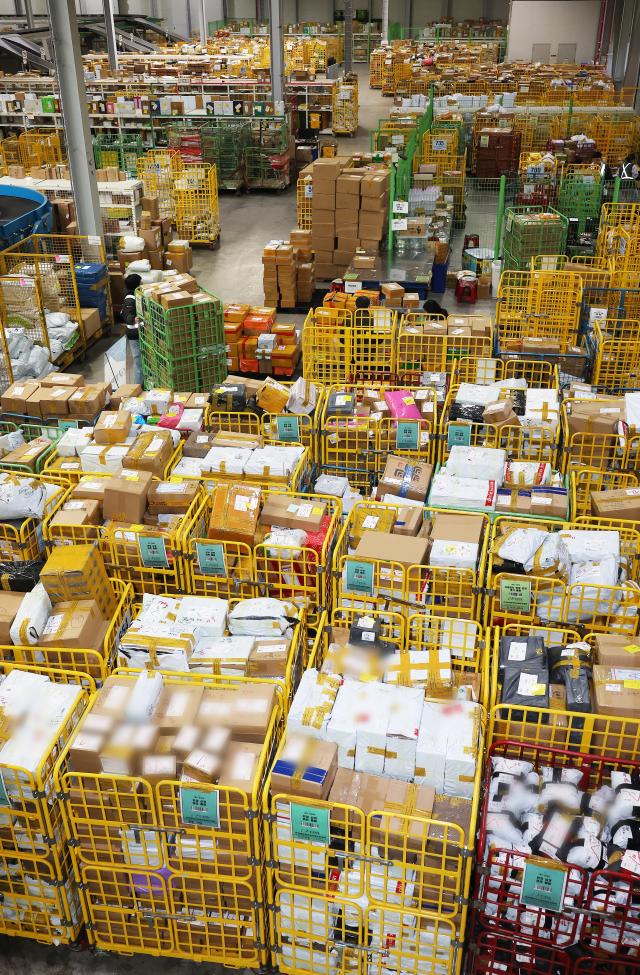 Packages from overseas purchases pile up at Incheon Airport Customs express logistics center in Jung-gu Incheon ahead of Black Friday Yonhap