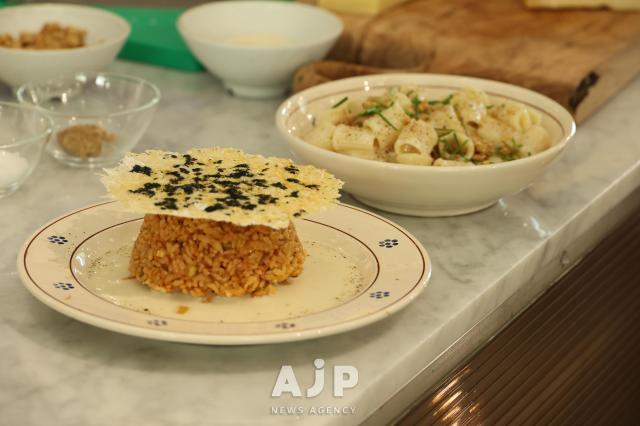 Pasta and kimchi fried rice prepared by Chef Fabri are displayed on the counter at the Italian Promotion Center in Gangnam District, Seoul on Nov. 14, 2025. AJP Yoo Na-hyun