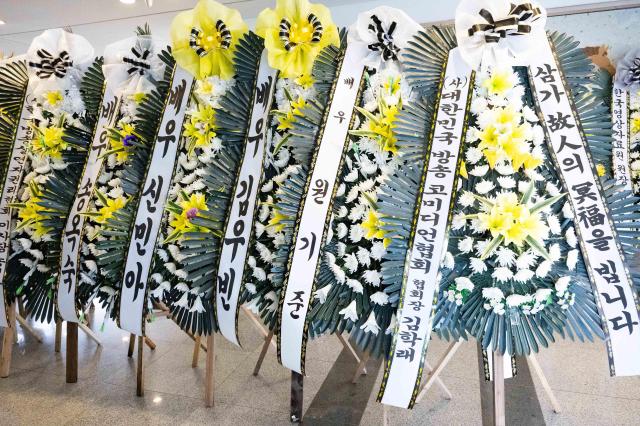 The wreaths of flowers for the late actor Lee Soon-jae stand in front of a memorial altar at Asan Medical Center in southern Seoul on Nov 25 2025