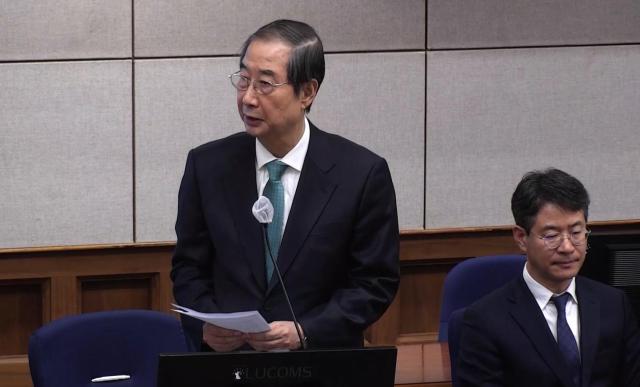 한덕수 전 국무총리가 26일 서울 서초구 서울중앙지법에서 열린 내란 우두머리 방조 내란 중요임무 종사 및 위증 등 혐의 결심공판에서 최후진술을 하고 있다 사진연합뉴스