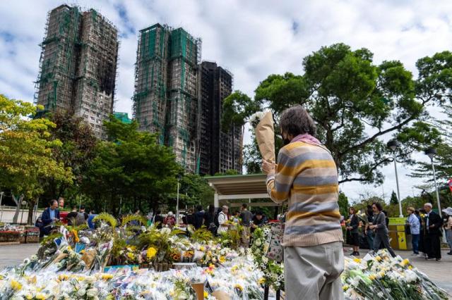 Govt ramps up safety inspections for high-rise buildings after Hong Kongs deadly fire