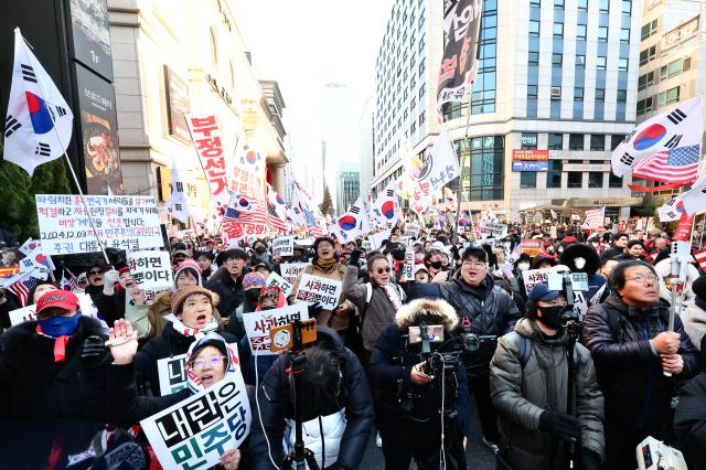 PHOTOS: One year after martial law, citizens return to the streets