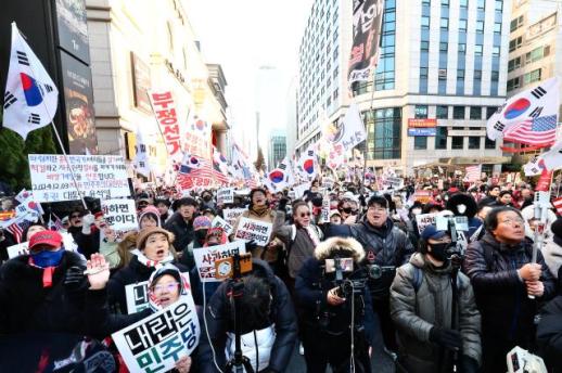 PHOTOS: One year after martial law, citizens return to the streets