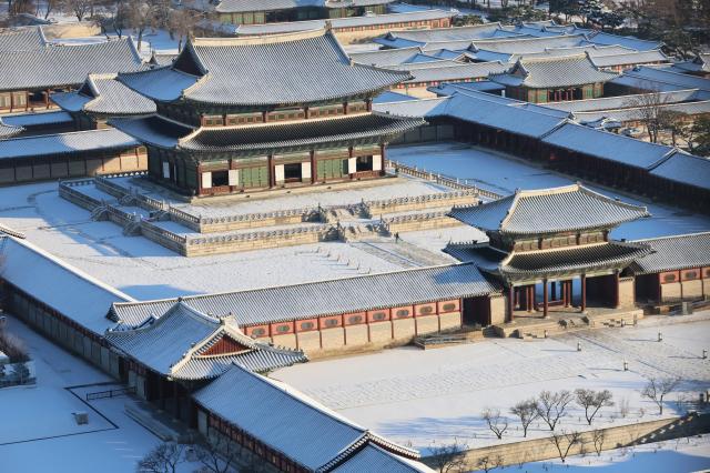 Gyeongbokgung Palace blanketed in snow in Jongno District Seoul on December 5 2025 YONHAP