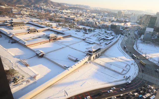 Gyeongbokgung Palace blanketed in snow in Jongno District Seoul on December 5 2025 YONHAP