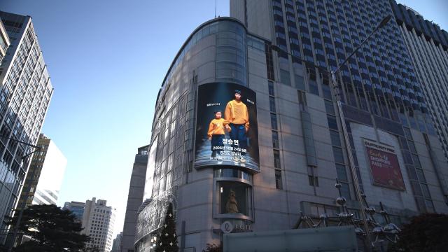 Daehong Communications’ “Runway to Home” campaign is displayed on the exterior media wall of Lotte Department Store in Myeong-dong Seoul in October 2025 Courtesy of 