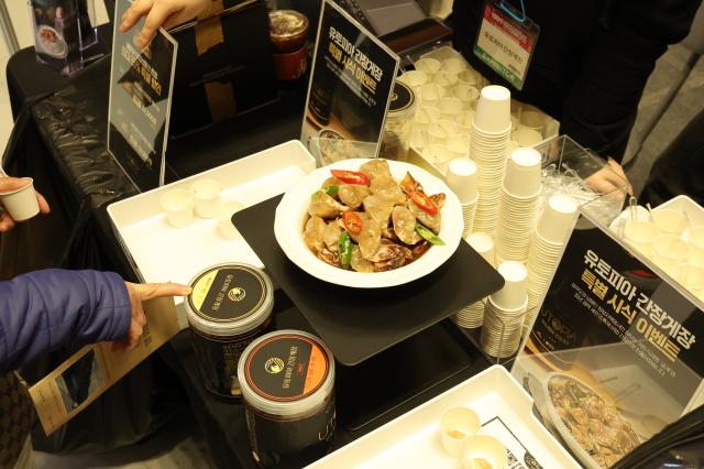 Visitors sample products at the Festive Gift Fair held at COEX in Seoul on Dec 11 2025 AJP Han Jun-gu