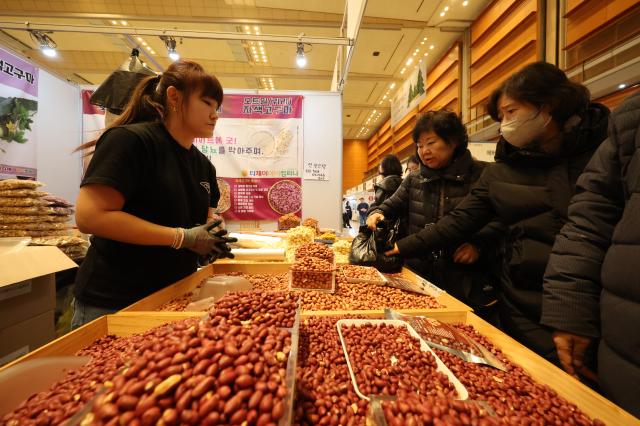 Visitors browse products at the Festive Gift Fair held at COEX in Seoul on Dec 11 2025 AJP Han Jun-gu	