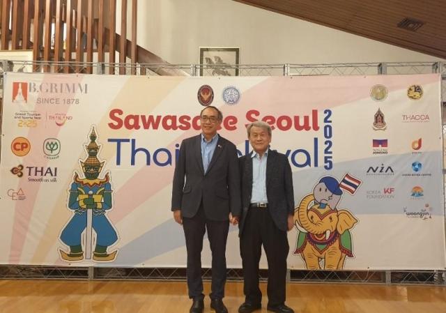 This file image shows columnist Choe Chong-dae right with HE Tanee Sangrat Ambassador of Thailand to Korea left at the reception celebrating the 10th anniversary of Sawasdee Seoul 2025 held at the Thai Ambassador’s Residence Seoul on September 1 2025 Courtesy of Choe Chong-dae