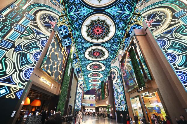 Visitors view a large Christmas-themed LED display at Inspire Entertainment Resort in Jung-gu Incheon on Dec 16 2025 AJP Han Jun-gu
