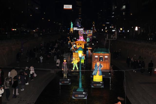 Lanterns and other installations are on display along the Cheonggye Stream in central Seoul on Dec 12 2025 AJP Yoo Na-hyun