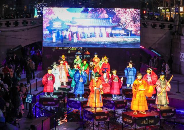Lanterns and other installations are on display along the Cheonggye Stream in central Seoul on Dec 12 2025 AJP Yoo Na-hyun