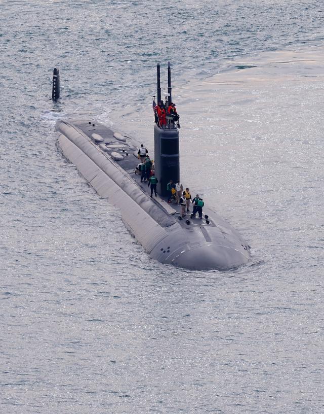 The nuclear-powered submarine USS Greeneville arrives at a naval base in the southeastern port city of Busan on Dec 23 2025 Yonhap