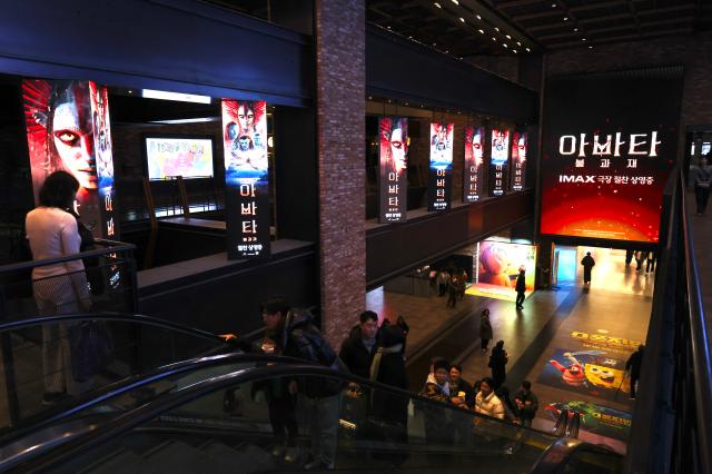 Visitors make their way to theater halls at CGV in Yongsan Seoul Dec 30 AJP Han Jun-gu