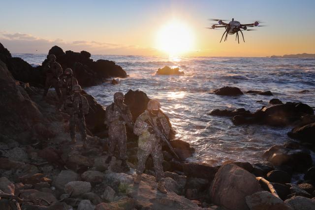 South Korean Army soldiers assigned to the 23rd Security Brigade carry out coastal surveillance near Samcheok Gangwon Province with the support of a reconnaissance drone on Dec 31 2025 Yonhap