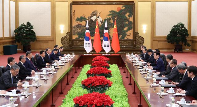 Lee Jae-myung and Xi Jinping hold a summit at the Great Hall of the People in Beijing on Jan 5 2026