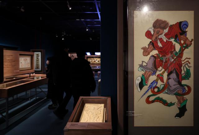 Visitors view exhibits at a special exhibition marking the Year of the Red Horse The Famous Feast of the Horse at the National Folk Museum of Korea in Jongno-gu Seoul on Jan 5 2026 AJP Yoo Na-hyun