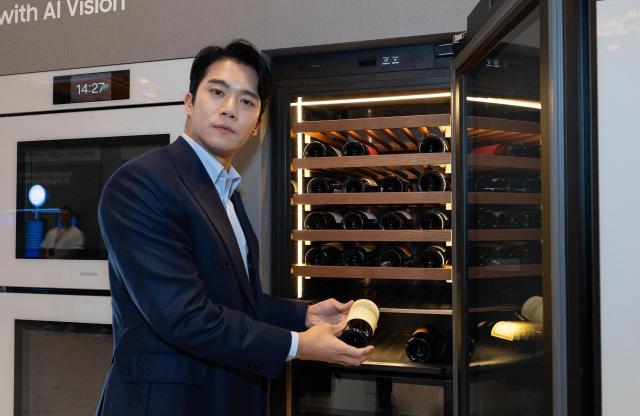 Actor Ha Seok-jin introduces Samsung Electronics’ “Infinite AI Wine Refrigerator” at the company’s standalone “The First Look” exhibition hall at CES 2026 Courtesy of Samsung Electronics